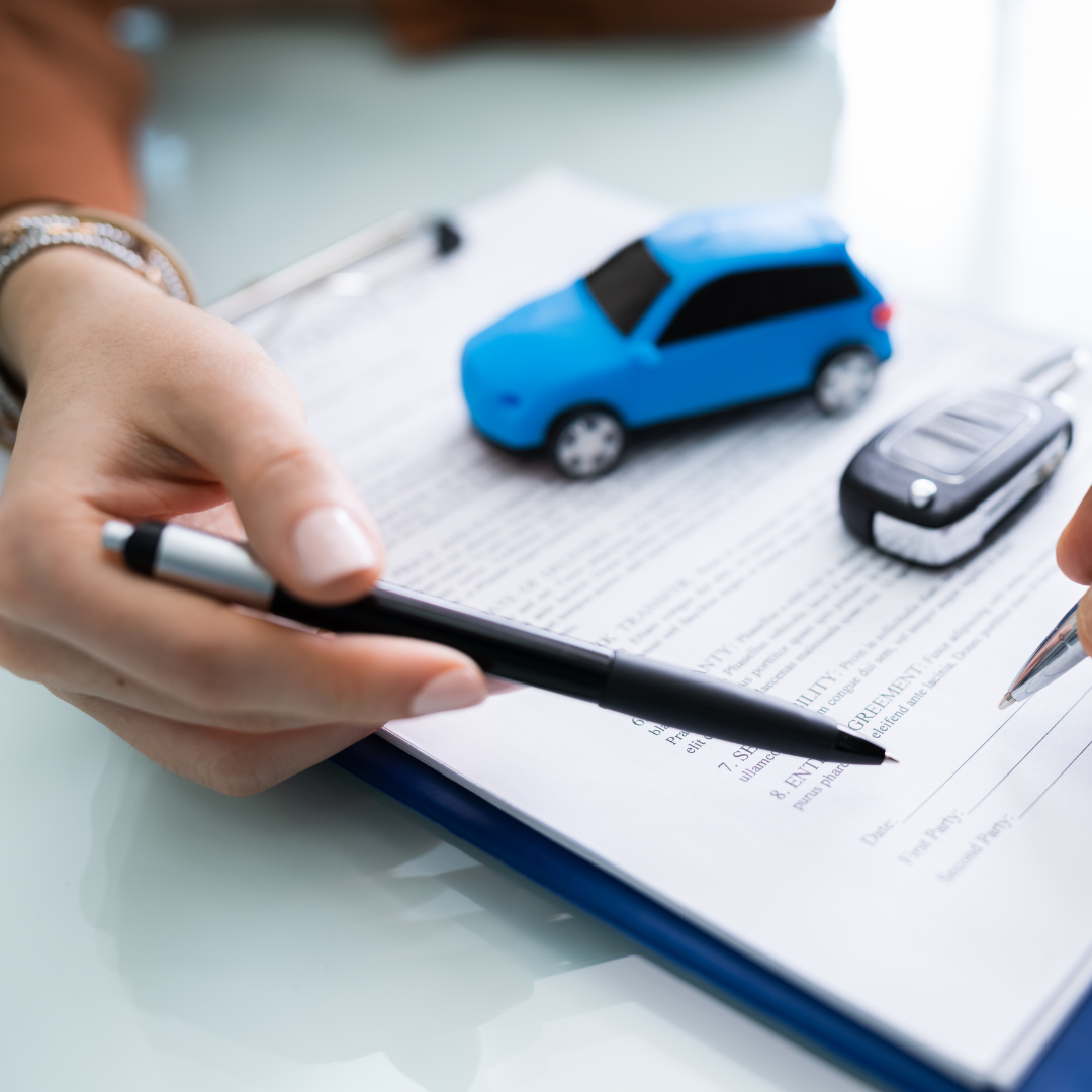 Close-up view of a car finance agreement with highlighted terms related to interest rates and fees